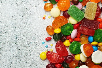 Bright candy lollies on white background