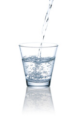 Picture in blue tone pouring water into a glass.with Clipping Path.