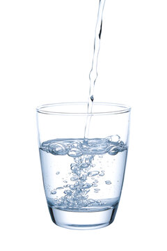 Picture in blue tones pouring water into a glass.with Clipping Path.