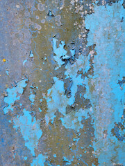 background of a very old metal rusty wall painted with bright blue paint, which began to flake off, become covered with corrosion and mold