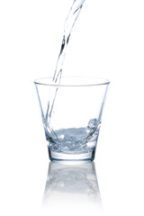 A picture of pouring water into a glass.with Clipping Path.