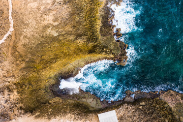 Aerial view above scenery of Curacao, Caribbean with ocean, coast