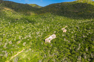 Aerial view above scenery of Curacao, Caribbean with old ruins in mountains