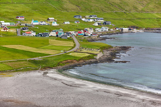 Faroe islands coastine. Sandvik village with colorful houses. Suduroy