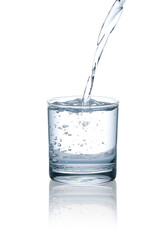 Pour drinking water into a glass with bubbles.with Clipping Path.