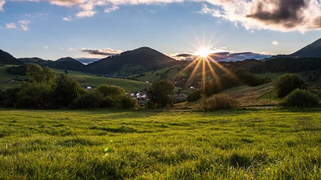 Peaceful Sunrise in fresh green spring meadow in countryside Europe nature Landscape Time lapse