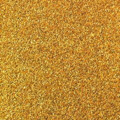 background of glittering golden glitter ideal for decoration or as a backdrop