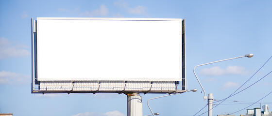 Mockup on a billboard. Advertising field on blue sky background