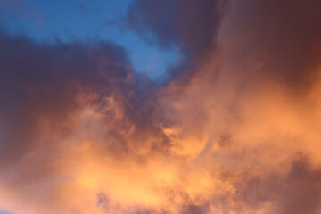 Clouds illuminated at sunrise.