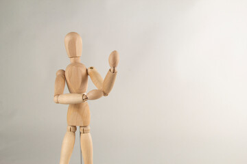 Gliederpuppe Holz zeig die Hand