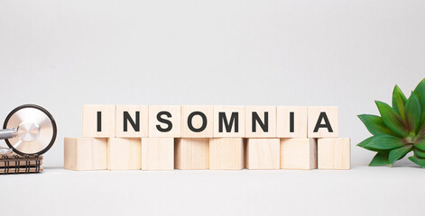 INSOMNIA word made with wooden blocks concept