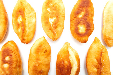 Fried patties in oil isolated on a white background.