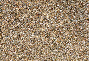 thousands of many small pebbles of many size