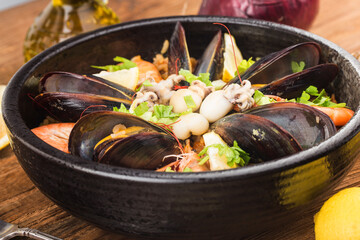 Tasty Spanish paella with seafood .