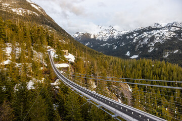 Suspension Bridge on Top of a Mountain in Squamish, North of Vancouver, British Columbia, Canada. Sea to Sky Gondola Summit © edb3_16