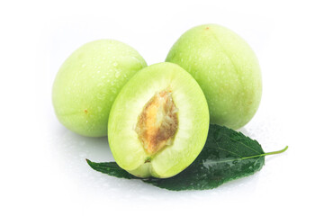 Green plum isolated on white background