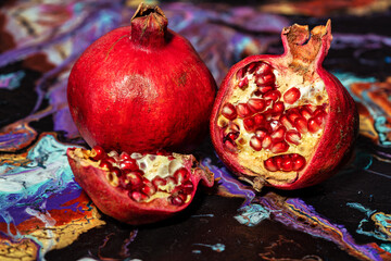 Pomegranate on the abstract background