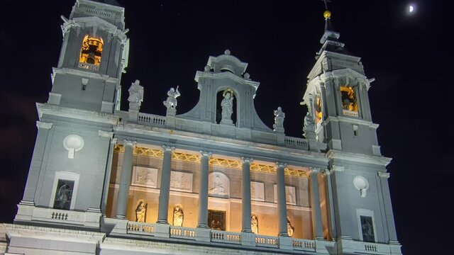 Santa Maria la Real de La Almudena illuminated at night timelapse hyperlapse - Cathedral in Madrid, Spain