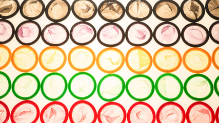 Colorful condoms background.