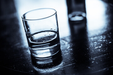 Whisky glass on a wooden surface