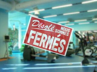 in French inscription sorry we are closed. introducing forbidden measures for attending group...