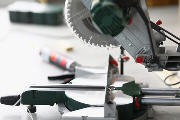 Closeup of high performance electric saw in workshop