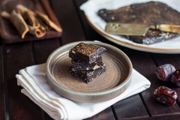 Vegan chocolate brownie with nuts and chocolate