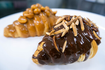 caramel macadamia butter croissant  and chocolate stick top