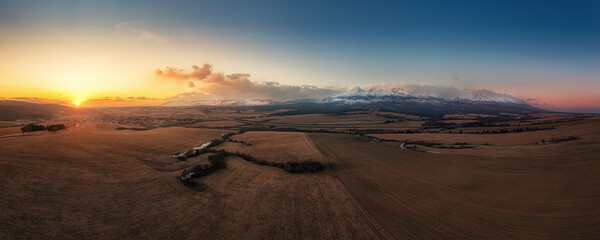 spring sub-Tatra valley at sunset, golden hour