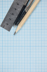 Drawing instruments lying on graph paper