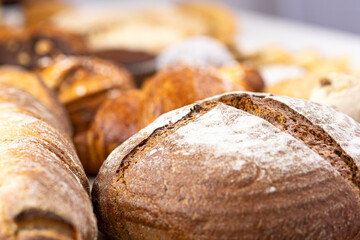 Round Gluten-free Buckwheat Bread with a crispy brown crust. Selective focus.