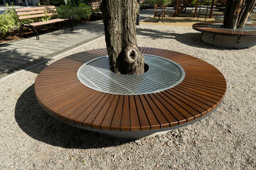 decorative metal grates in the design of the park with landscaping on the playground