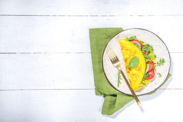Stuffed  omelet with fresh vegetables