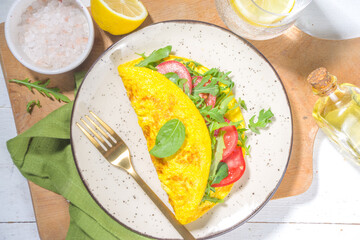 Stuffed  omelet with fresh vegetables