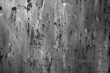 Metal texture with scratches and cracks which can be used as a background