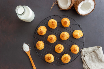Coconut cookies on a dark background. Baking. Vegetarian food.