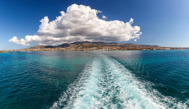 Seascape and ship lane as the local ferry boat travels from Paros island to Antiparos island, in Cyclades islands, Greece, Europe.