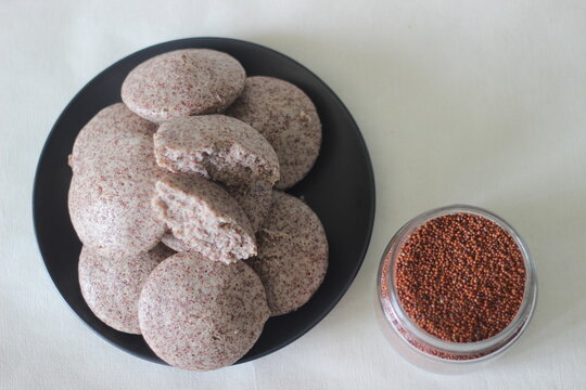 Steamed Cakes Made With Finger Millets And Skinned Black Gram. Locally Known As Ragi Idli.