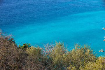 Fototapeta na wymiar emerald color sea mediterranean and a beach in Nice, south France Europe. blue interior idea.