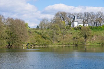 Lake (Immerather maar) in the Volcanic Eifel or Vulkan Eifel mountains in Germany