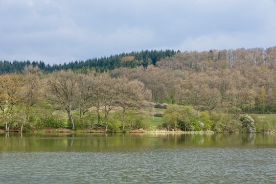 Lake (Immerather maar) in the Volcanic Eifel or Vulkan Eifel mountains in Germany