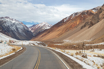 Photo of a road crossing the mountains.