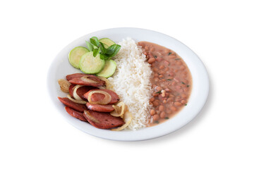 Typical Brazilian food with rice, beans, pepperoni sausage and salad. White background.