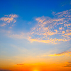 scenic of the strong sunrise and cloud on the orange sky.