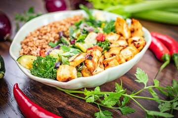 Tofu marinated in miso on fried green vegetables with ginger and chilli according to the sirt diet