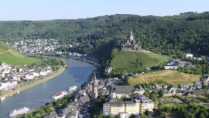 Fototapeta na wymiar aerial view of cochem castle with river next to it