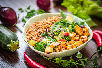 Tofu marinated in miso on fried green vegetables with ginger and chilli according to the sirt diet