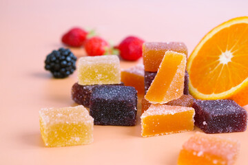 A colorful variety traditional French fruit jellies with fresh variant fruit as strawberry,...