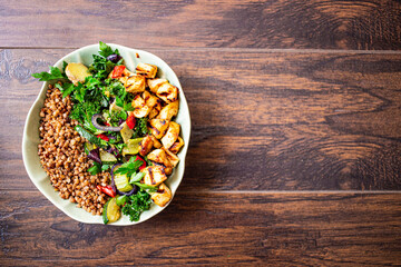 Tofu marinated in miso on fried green vegetables with ginger and chilli according to the sirt diet