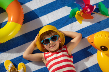 Happy child on summer vacation - 427714523